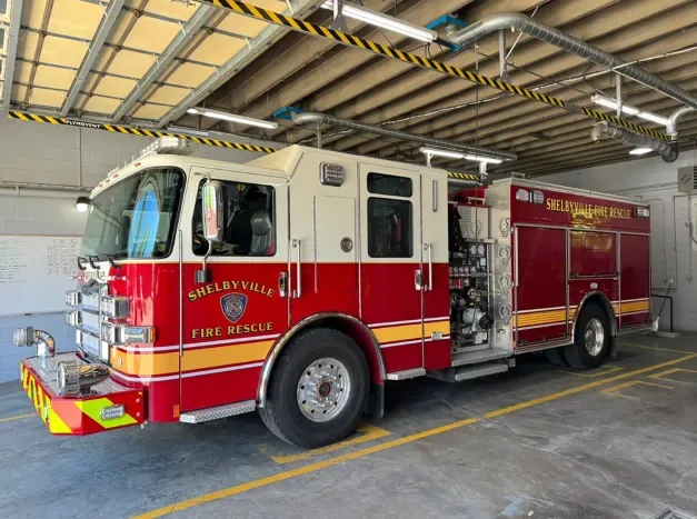 2024 Pierce Saber pumper fire truck parked indoors in station garage bay