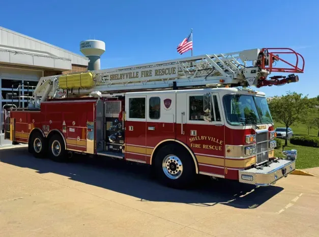 1997 Pierce Lance Quint 11 105-foot aerial fire truck in sunny fire station